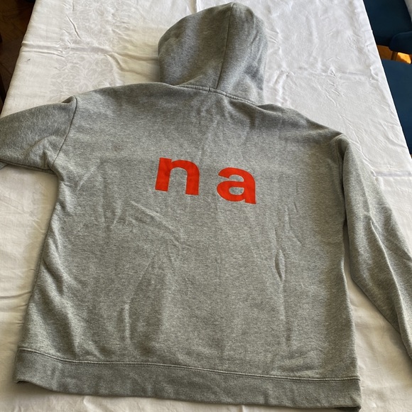 Tna oversize “T” hoodie with front pocket. Grey with Orange T logo. Size Small. - Picture 6 of 7